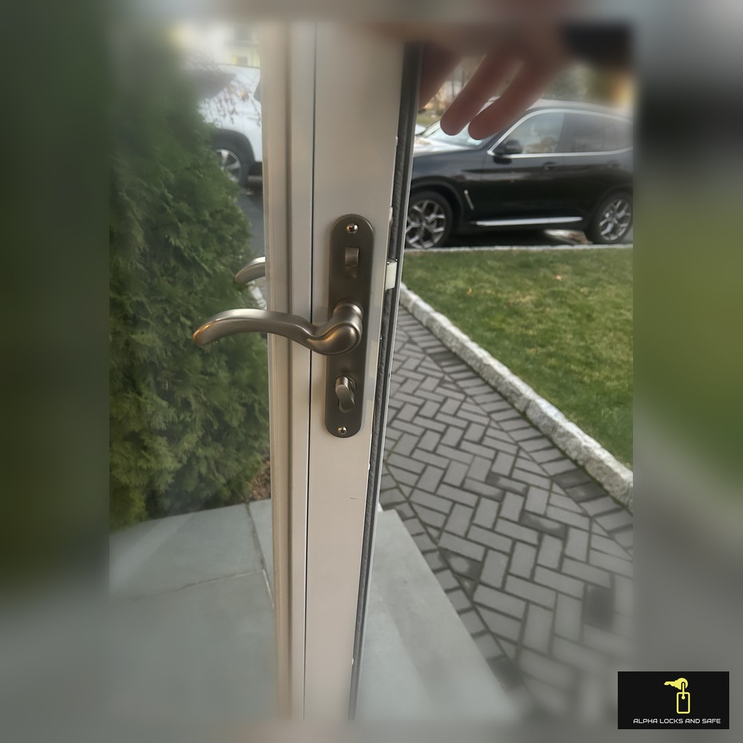 Locksmith servicing a door lock in Westchester County