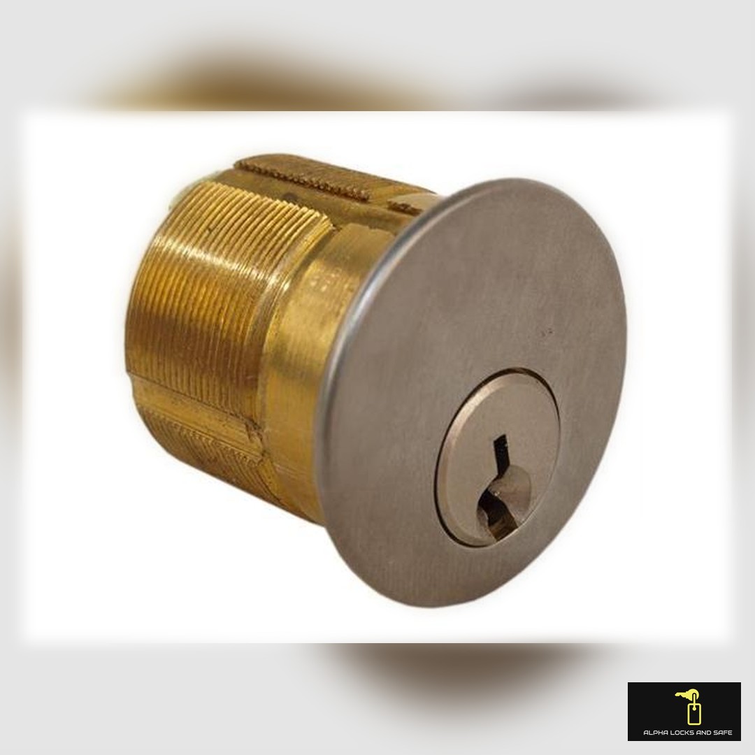 Locksmith rekeying a front door lock during a move